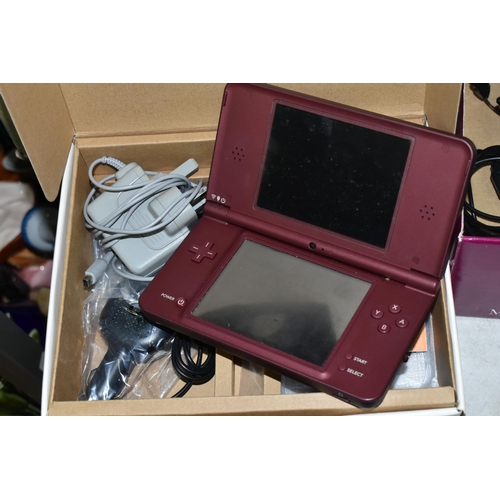 565 - NINTENDO DSI XL BOXED AND QUANTITY OF GAMES, games include Legend of Zelda Spirit Tracks, Brain Trai... 