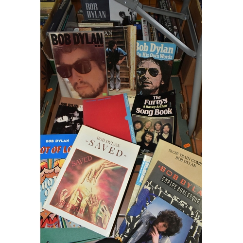 567 - MUSIC INTEREST - TWO BOXES OF BOOKS AND EPHEMERA, to include approximately thirty books about Bob Dy... 