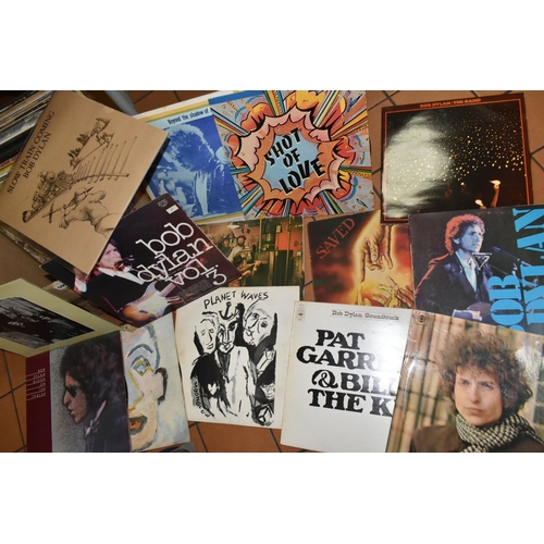 595 - A BOX CONTAINING APPROX FIFTY LPs, A SINGLE AND A TAPE BOXSET including 32 by Bob Dylan items of not... 