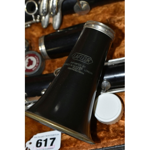 617 - A CASED LA FLEUR CLARINET with a mouthpiece stamped 10 and lower section stamped 199, along with spa... 