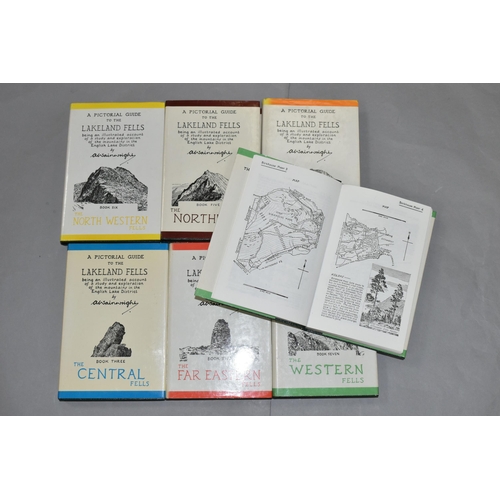 623 - ALFRED WAINWRIGHT - A SET OF SEVEN LATER EDITION PICTORAL GUIDE BOOKS, comprising The Western Fells,... 