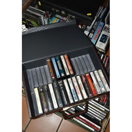 634 - TWO BOXES AND FOUR CASES CONTAINING OVER ONE HUNDRED AND NINETY CDs, CASSETTE AND VIDEO TAPES includ... 