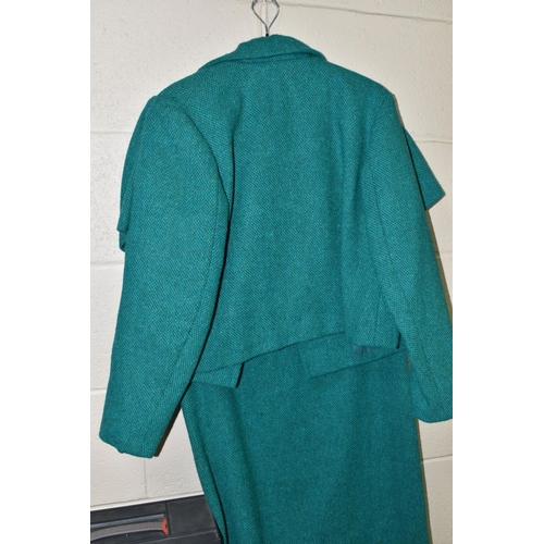 635 - A LADIES VINTAGE HAND TAILORED GREEN SUIT, comprising of a dress and  a jacket, approximate size 12,... 