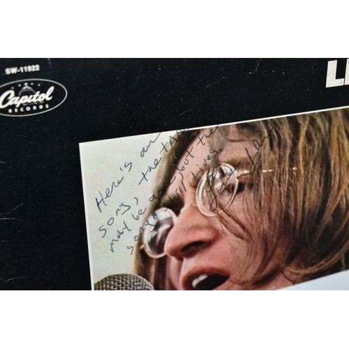 639 - JOHN LENNON, a Capitol Records import of the album 'Let it Be' with  handwriting on the cover 'Here'... 