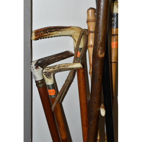 648 - SEVEN ANTIQUE AND VINTAGE RIDING CROPS AND WALKING STICKS ETC, to include a crop with silver collar ... 