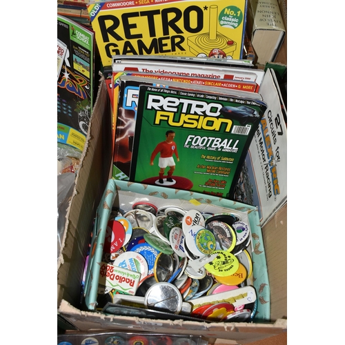 651 - TWO BOXES OF VINTAGE MAGAZINES, POSTCARDS AND EPHEMERA, to include a collection of 1970's/1980's pin... 