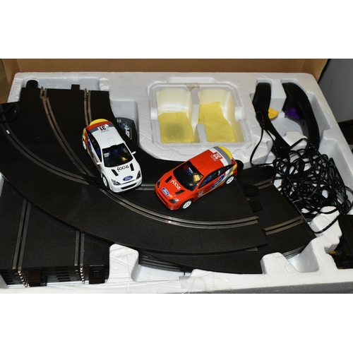 660 - A BOXED SET OF SCALEXTRIC SPEED EXTREME- SPORT, comprising two hand sets, two Ford Focus cars and tr... 