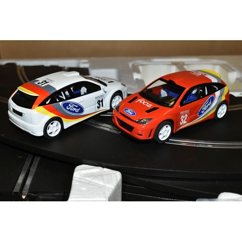 660 - A BOXED SET OF SCALEXTRIC SPEED EXTREME- SPORT, comprising two hand sets, two Ford Focus cars and tr... 