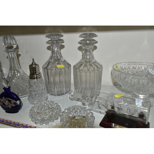 664 - A COLLECTION OF CUT GLASS DECANTERS AND STUDIO GLASS PAPERWEIGHTS, comprising a Nailsea glass walkin... 