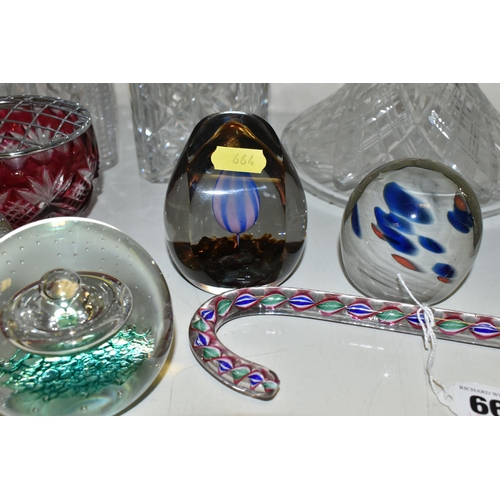 664 - A COLLECTION OF CUT GLASS DECANTERS AND STUDIO GLASS PAPERWEIGHTS, comprising a Nailsea glass walkin... 