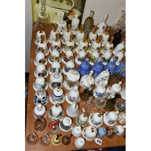 679 - A QUANTITY OF DECORATIVE CERAMIC AND GLASS BELLS, to include a set of twelve Danbury Mint Fairy tale... 