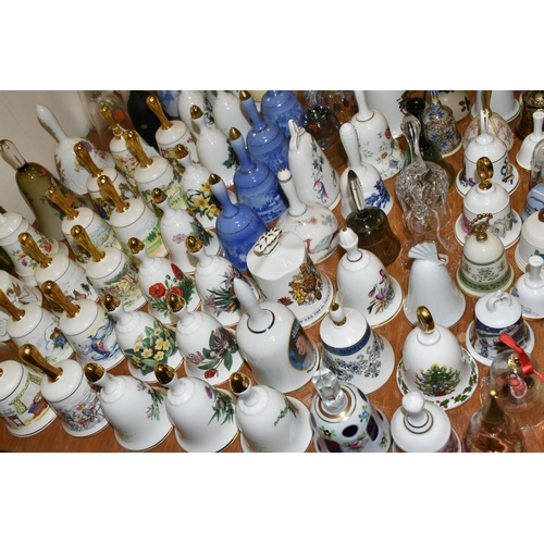 679 - A QUANTITY OF DECORATIVE CERAMIC AND GLASS BELLS, to include a set of twelve Danbury Mint Fairy tale... 