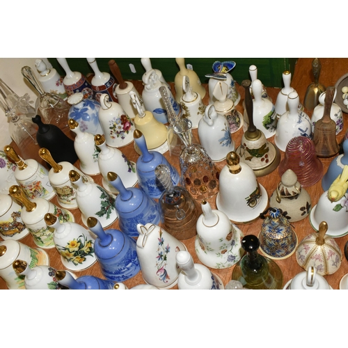 679 - A QUANTITY OF DECORATIVE CERAMIC AND GLASS BELLS, to include a set of twelve Danbury Mint Fairy tale... 