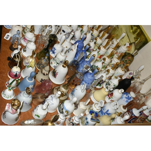 679 - A QUANTITY OF DECORATIVE CERAMIC AND GLASS BELLS, to include a set of twelve Danbury Mint Fairy tale... 