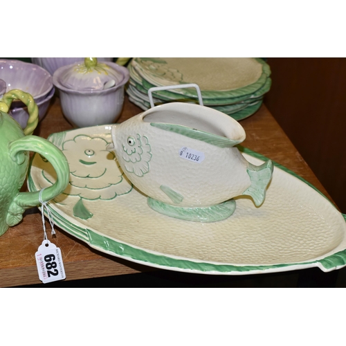 682 - ART DECO FISH SHAPED DINNER WARES ETC, comprising six 20cm plates, serving dish and sauce boat, toge... 