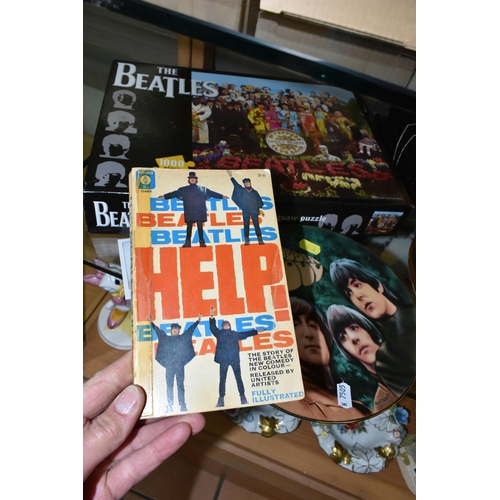 690 - A COLLECTION OF 'THE BEATLES' THEMED ITEMS, to include The Beatles In Help! by Al Hine, 1965, an iss... 