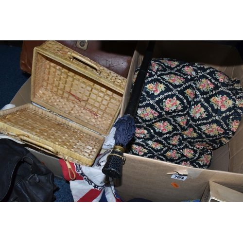 704 - TWO BOXES AND LOOSE WALKING STICKS, VINTAGE CLOTHES, ACCESSORIES AND LINENS, to include a tall galva... 