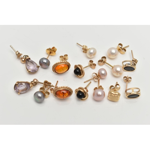 128 - AN ASSORTMENT OF 9CT GOLD AND YELLOW METAL EARRINGS, the first a pair of yellow gold and onyx stud e... 