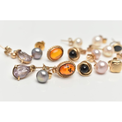 128 - AN ASSORTMENT OF 9CT GOLD AND YELLOW METAL EARRINGS, the first a pair of yellow gold and onyx stud e... 