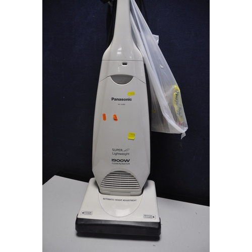 1142 - A PANASONIC MC-UG302 UPRIGHT VACUUM with spare bags (PAT pass and working)