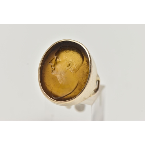 1 - A LATE 18TH CENTURY INTAGLIO, a brown glass intaglio depicting what is believed to be Julius Caesar ... 