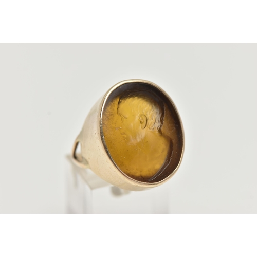 1 - A LATE 18TH CENTURY INTAGLIO, a brown glass intaglio depicting what is believed to be Julius Caesar ... 