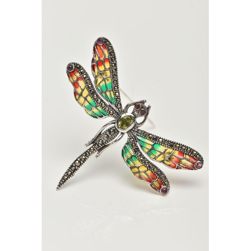 18 - A WHITE METAL PLIQUE A JOUR BROOCH, in the form of a dragonfly, peridot and marcasite set body and r... 