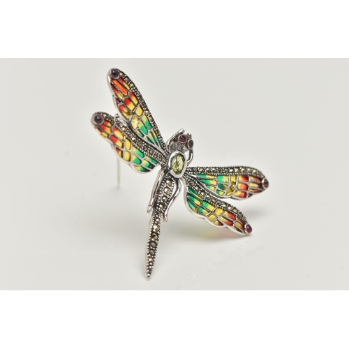 18 - A WHITE METAL PLIQUE A JOUR BROOCH, in the form of a dragonfly, peridot and marcasite set body and r... 