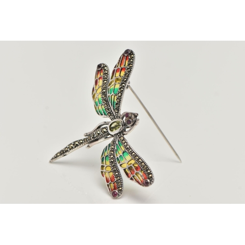 18 - A WHITE METAL PLIQUE A JOUR BROOCH, in the form of a dragonfly, peridot and marcasite set body and r... 