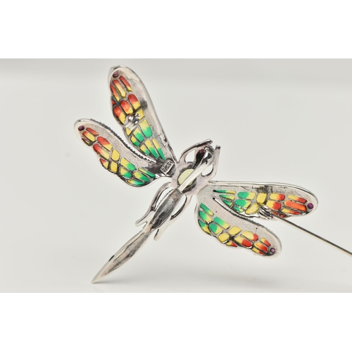 18 - A WHITE METAL PLIQUE A JOUR BROOCH, in the form of a dragonfly, peridot and marcasite set body and r... 