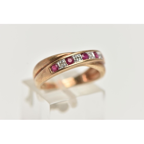 25 - A 9CT GOLD RUBY AND DIAMOND HALF ETERNITY RING, set with a row of alternating rubies and single cut ... 