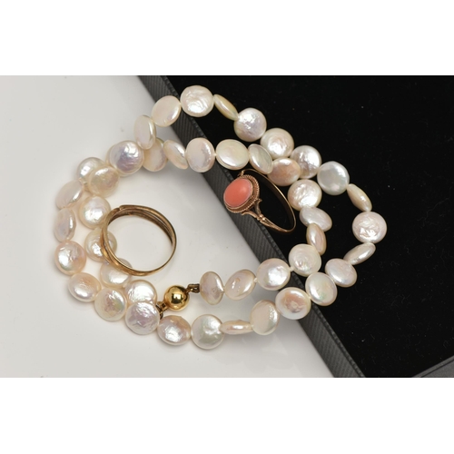 28 - TWO RINGS AND A CULTURED PEARL NECKLACE, the first  a coral cabochon ring, bifurcated shoulders lead... 