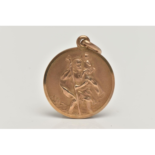 36 - A 9CT GOLD ST.CHRISTOPHER PENDANT, of an oval form, approximate diameter 24.2mm, hallmarked 9ct Shef... 