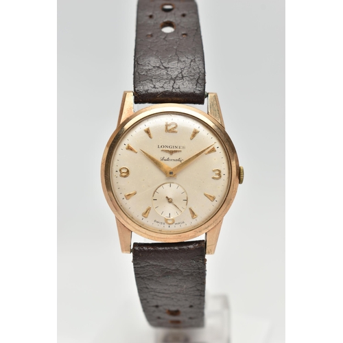 39 - A GENTS 9CT GOLD 'LONGINES' AUTOMATIC WRISTWATCH, round silver dial signed 'Longines Automatic' Arab... 