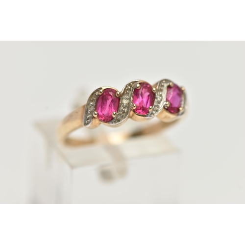 48 - A 9CT GOLD GEM SET RING, three oval cut synthetic rubies accented with four round brilliant cut diam... 