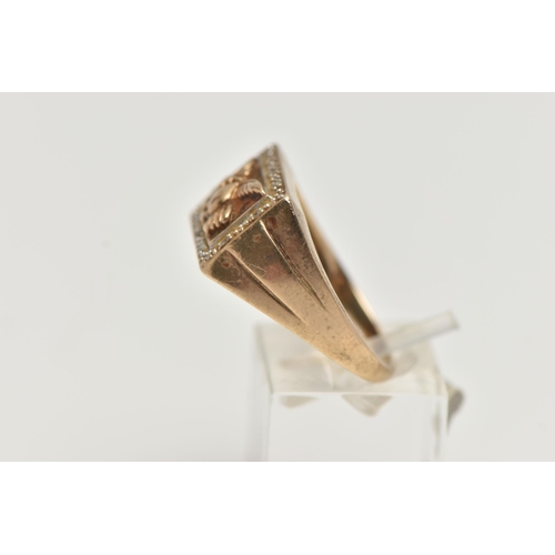 54 - A 9CT GOLD EAGLE SIGNET RING, of a rectangular form depicting a flying eagle, in a surround of singl... 