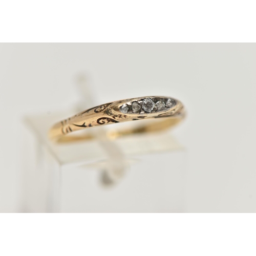 68 - A YELLOW METAL FIVE STONE DIAMOND RING, set with a row of small old cut and diamond chips, to a scro... 