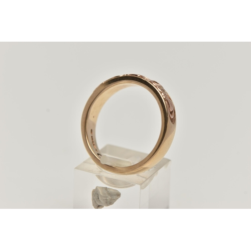 83 - A 9CT GOLD 'CARIAD' RING, yellow gold band ring, scrolling font to the outer band with the word 'Car... 