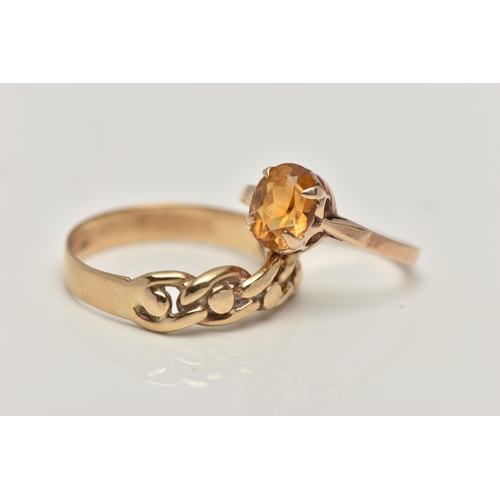 91 - A 9CT GOLD CITRINE RING AND A YELLOW METAL RING, the first a yellow gold ring set with an oval cut c... 