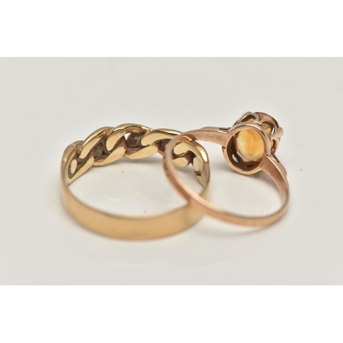 91 - A 9CT GOLD CITRINE RING AND A YELLOW METAL RING, the first a yellow gold ring set with an oval cut c... 