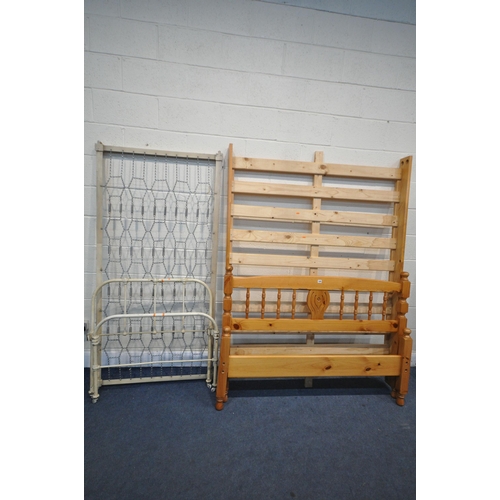 1485 - A PINE 4FT 6 BEDSTEAD along with a tubular metal single bedstead (condition:- footboard with loose j... 