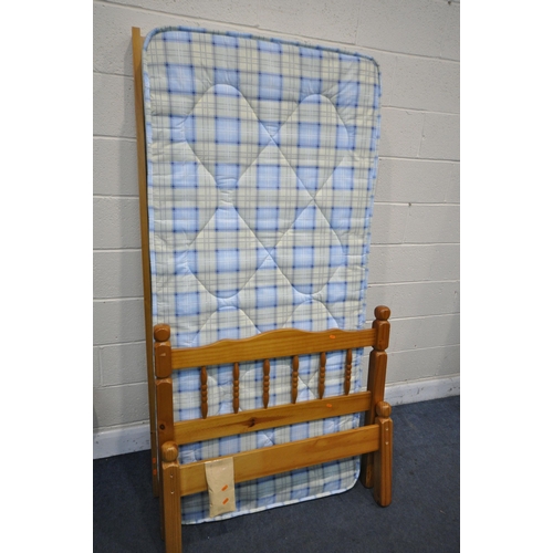 1486 - A PINE SINGLE BEDSTEAD WITH MATTRESS (condition:- one slat broken)