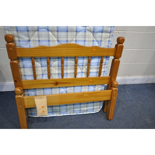 1486 - A PINE SINGLE BEDSTEAD WITH MATTRESS (condition:- one slat broken)