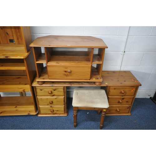 1490 - A SELECTION OF PINE FURNITURE, to include a dressing table, stool, open bookcase, a tv stand and 5ft... 