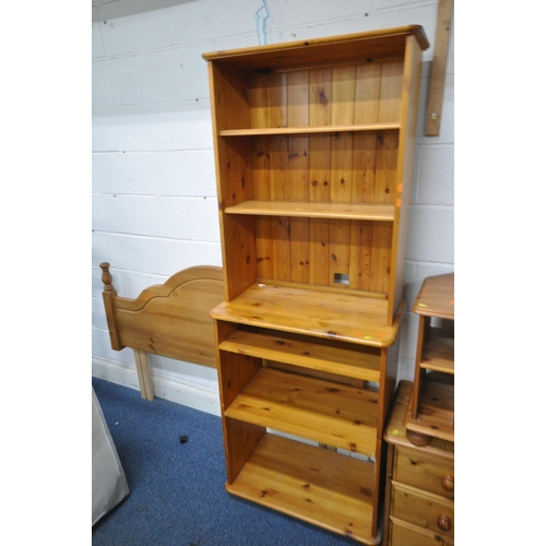 1490 - A SELECTION OF PINE FURNITURE, to include a dressing table, stool, open bookcase, a tv stand and 5ft... 