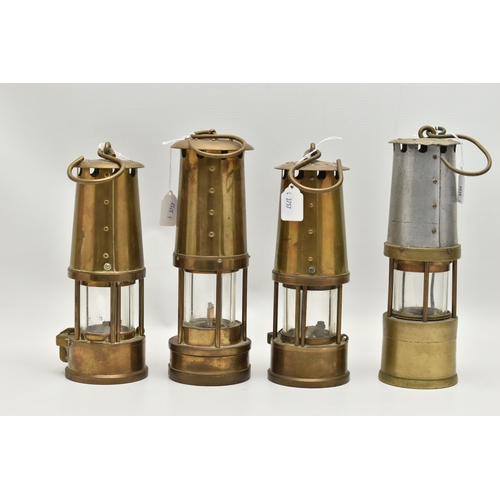 766A - FOUR 20TH CENTURY MINERS LAMPS, comprising two brass Protector Lamp & Lighting Co Ltd Type 6 lamps, ... 