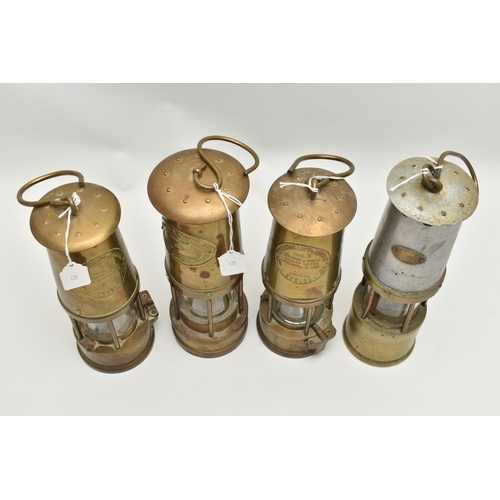 766A - FOUR 20TH CENTURY MINERS LAMPS, comprising two brass Protector Lamp & Lighting Co Ltd Type 6 lamps, ... 