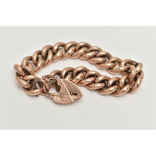 140 - A 9CT ROSE GOLD CURB LINK BRACELET WITH PADLOCK CLASP, alternating between textured and polished hol... 