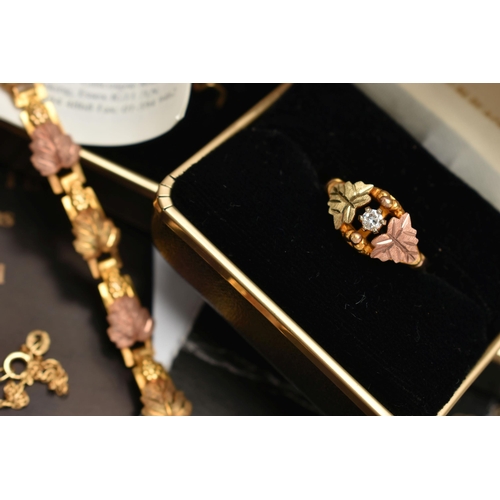 150 - A 'LANDSTROMS' 9CT GOLD SUITE OF JEWELLERY, to include an open work pendant necklace of rose and yel... 