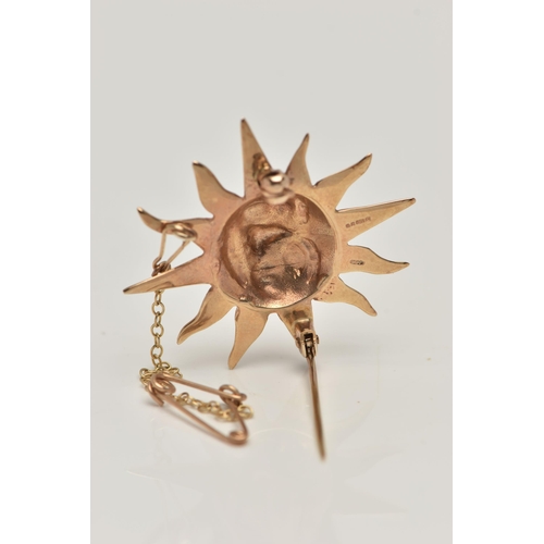 165 - A 9CT GOLD SUN BROOCH, sun with face, fitted with a brooch pin and safety clasp, with additional saf... 